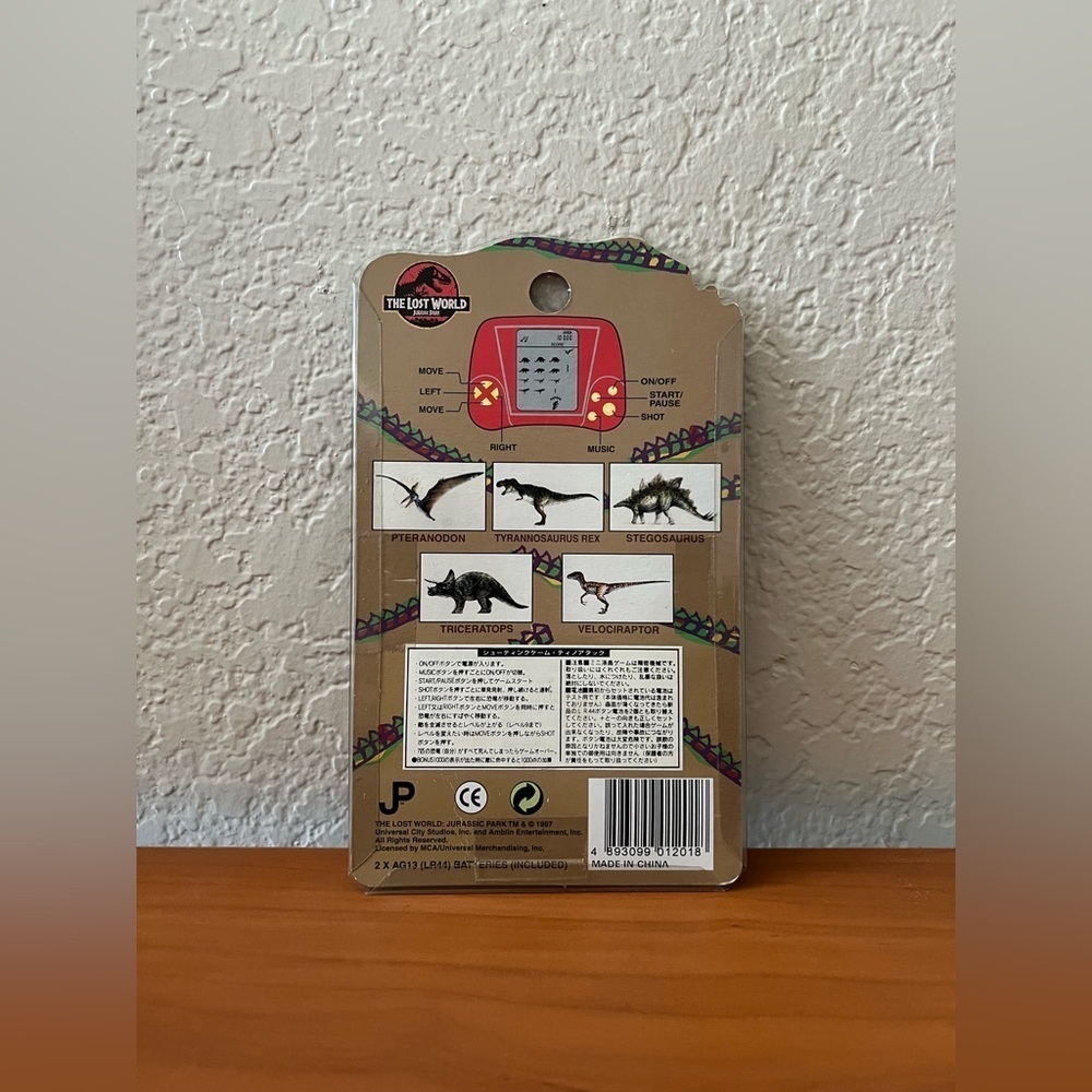 RARE NEW 1997 Universal Studios Japan Jurassic Park Lost World Dino Attack Game - Picture 2 of 4